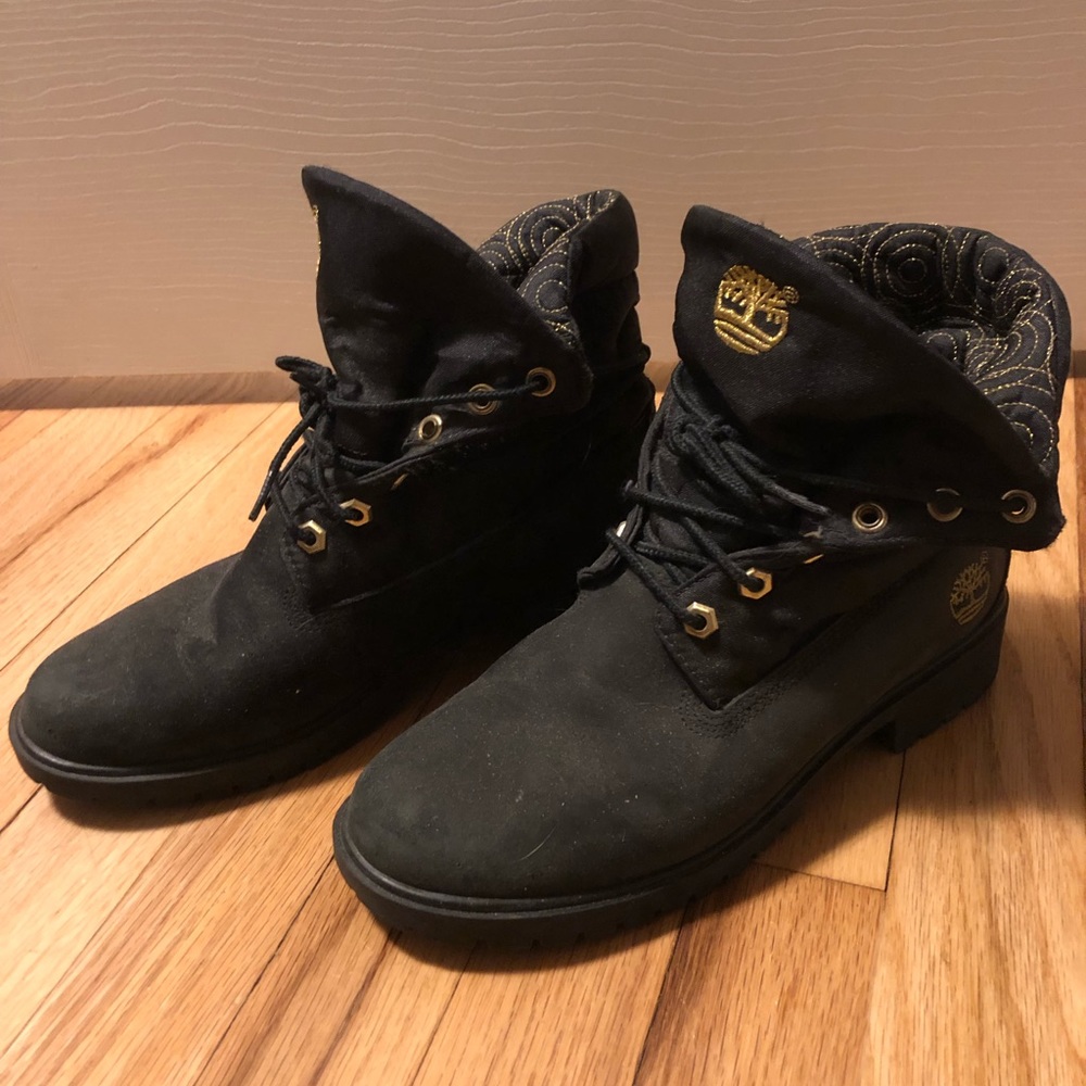 Black and gold Timberlands
